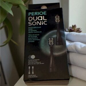 New in sealed box Avon Perioe Dual Brush Heads 2 in box